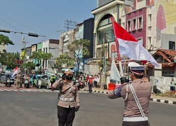 HUT KE-80 RI - Detik-detik proklamasi di Simpang Juanda-Margonda, Kota Depok, Minggu (17/8/2025). 
